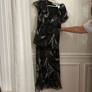 New York City designer company. Skirt set. XL shirt; large top. Good condition